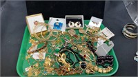 Tray lot of gold tone jewelry includes