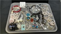 Tray of silver tone and Black jewelry to include