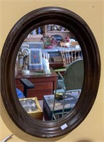 Oval wood frame mirror measures 15 x 12 - does