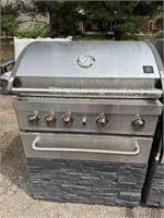 Members mark faux stone gas grill