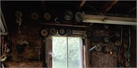LOT OF GRINDING WHEELS ON WALL