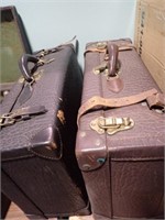 PAIR OF LEATHER SUITCASES