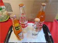 4 Soda Bottles