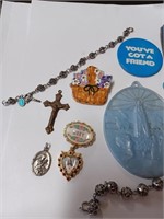 Lot to Include Religious Bracelets, Brooch,