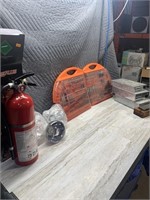 Unused ABC fire extinguisher, floodlights,