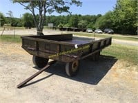 e. 8ft x 12ft steel bed mounted on hay wagon frame