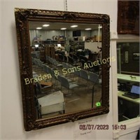ANTIQUE FRAMED 30" X 24" WALL MIRROR. SOME DAMAGE