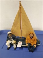 Wooden sailboat with 2 sailor figures