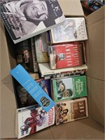 Box of books. John Wayne, JFK, Ellis Island and