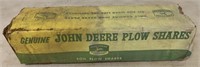 empty cardboard John Deere Plow Shares Box