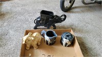 Elephant Cups, Figures