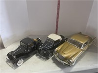 3 die cast cars