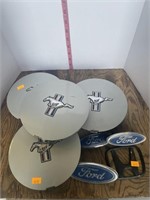Mustang hubcaps, ford emblems, misc