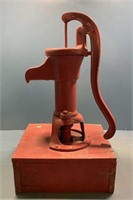 Red vintage hand pump