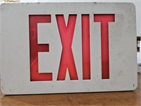 Commercial metal lighted EXIT sign. Been stored
