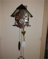 Swiss made cuckoo clock teeter totter and Chimney