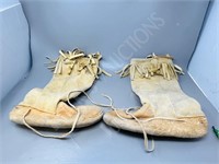 pair of leather  hand stitched moccasins