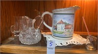 Pitcher and glassware on shelf lot
