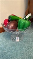 Glass pedestal serving bowl with glass vegetables