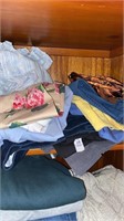 Shelf lot of woman’s clothes. Size 10 mostly