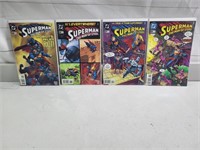 4 mint superman comics. Carded and sleeved