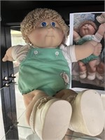 Display cabinet woth Cabbage patch Dolls