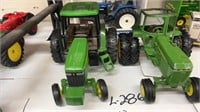 2- John Deere Toy Tractors
