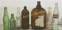 Vintage pop bottles , wine jugs  , wine bottles,