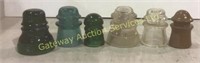 Insulators green , clear , and brown appox 30