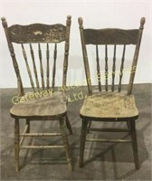 2 vintage wooden chairs .