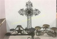 Iron candle holders and wall hanging .