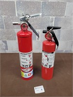 2 Fire extinguishers (showing charged)