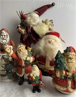 Collection of Santa Figurines  1 is a Music Box