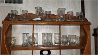 Wall display with 37 various shot glasses+Jim Beam