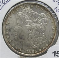 1885 Toning Morgan Silver Dollar.