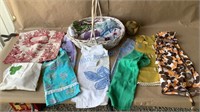 VINTAGE APRONS AND CLOTHESPIN BAG IN BASKET