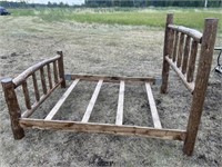 UNUSED QUEEN SIZE LOG BED FRAME,