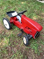 373- red pedal tractor