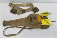 US Army belt and pack with metal danger signs.