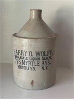 Vtg stoneware crock Harry o Wolff advertisement