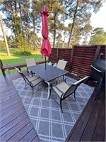 Outdoor table rug umbrella and stand