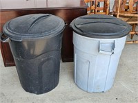 2 plastic trash cans