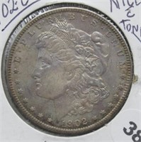 1902-O Morgan Silver Dollar. Nice & Toning.
