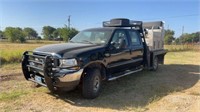 *2003 Ford F350 Flatbed w/Cages on Bed