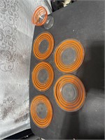 Orange striped plates & glass