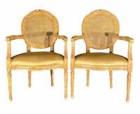 CARVED FRENCH STYLE ARM CHAIRS WITH CANE BACKS