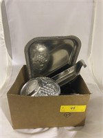 Box with serving trays, bowl, and gravy