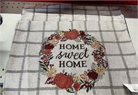 Embroidered home, sweet home placement