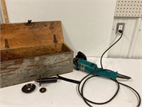 Makita angle grinder works. with wooden case.