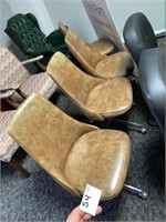 4 Brown Leather Retro Chairs on Rollers